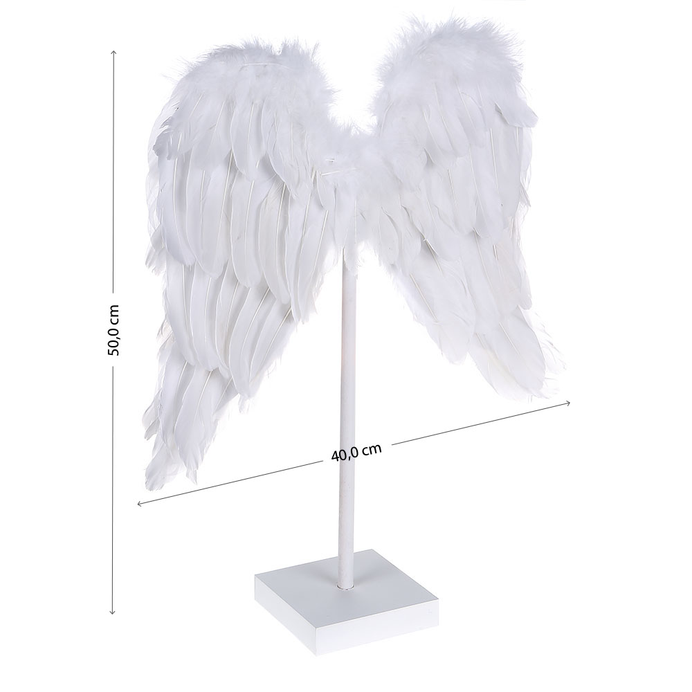 Angel feathers on a wooden stand